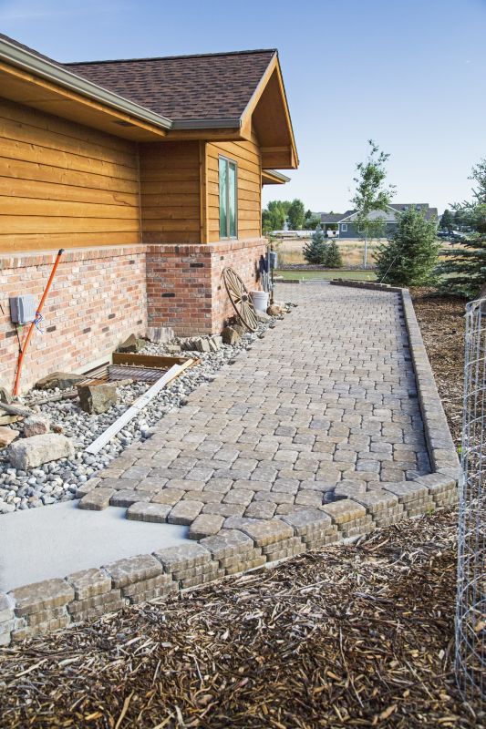 Concrete Walkways Vs. Pavers: Which Option Fits Your Property Best